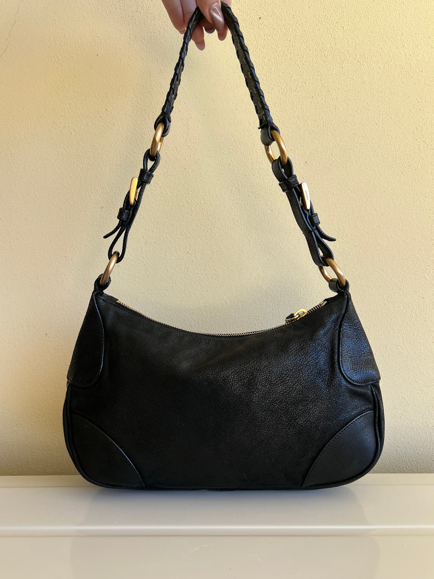 Prada con Tracolla a Catena Intrecciata