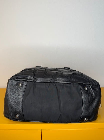 Prada nera Boston