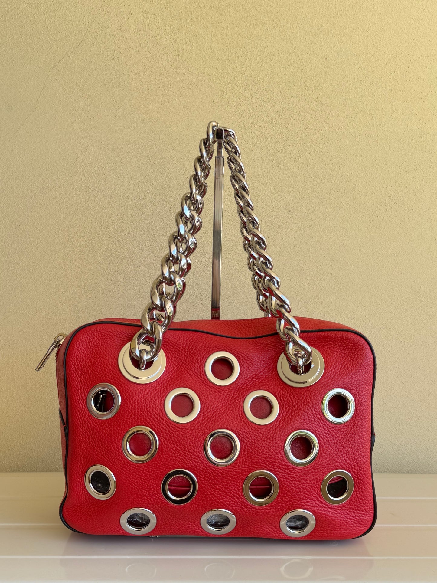 Prada con Catena Grommet