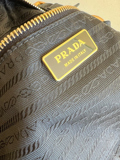 Prada con Tracolla a Catena Intrecciata
