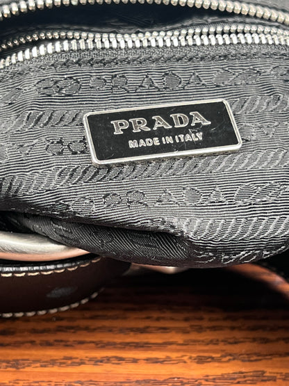 Prada impunture a contrasto