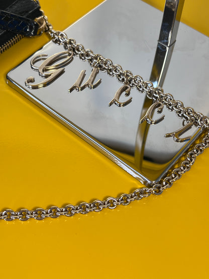 Pochette Gucci con Charms