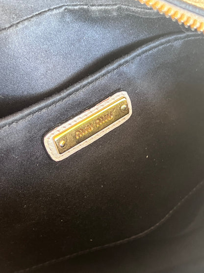 Miu Miu camera bag madras