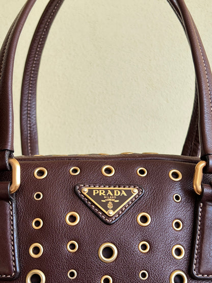 Prada gold studs