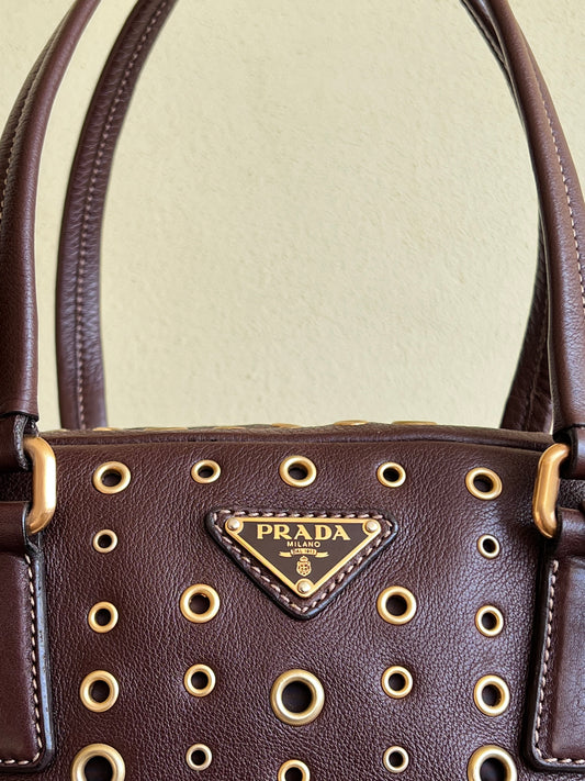Prada gold studs