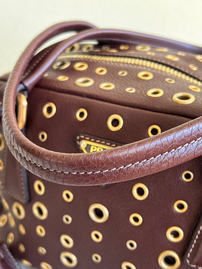 Prada gold studs