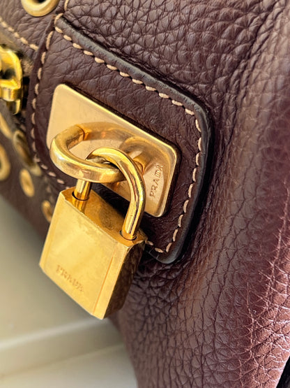 Prada gold studs