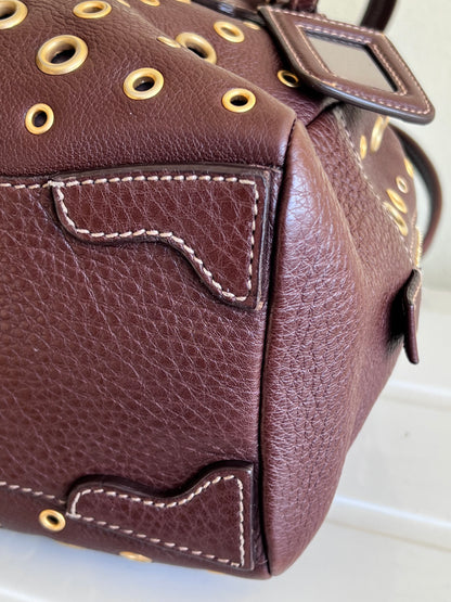 Prada gold studs
