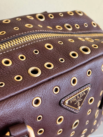 Prada gold studs