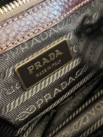 Prada gold studs